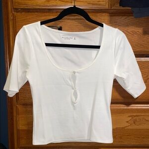White Scoop Neck Top with peep hole buttons